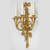A Symbolic and Distinguished Pair of Louis XVI Style Three-Light Gilt Bronze Wall Sconces  A Symbolic and Distinguished Pair of Louis XVI Style Three-Light Gilt Bronze Wall Sconces