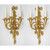 A Symbolic and Distinguished Pair of Louis XVI Style Three-Light Gilt Bronze Wall Sconces  A Symbolic and Distinguished Pair of Louis XVI Style Three-Light Gilt Bronze Wall Sconces