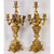 An ornate pair of Champleve French Gilt Bronze Candelabras with Enamel Ornamentation  An ornate pair of Champleve French Gilt Bronze Candelabras with Enamel Ornamentation