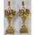 An ornate pair of Champleve French Gilt Bronze Candelabras with Enamel Ornamentation  An ornate pair of Champleve French Gilt Bronze Candelabras with Enamel Ornamentation