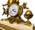 A Louis XVI Ormolu and White Marble Mantel Clock of Cupid