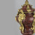 A pair of Fine Quality French Ormolu-Mounted Rouge Marble Urns and Cover Each with a bulbous body on a stepped plinth