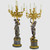 An Important Pair of Monumental Ormolu and Patinated Bronze Nine-Light Candelabra An Important Pair of Monumental Ormolu and Patinated Bronze Nine-Light Candelabra