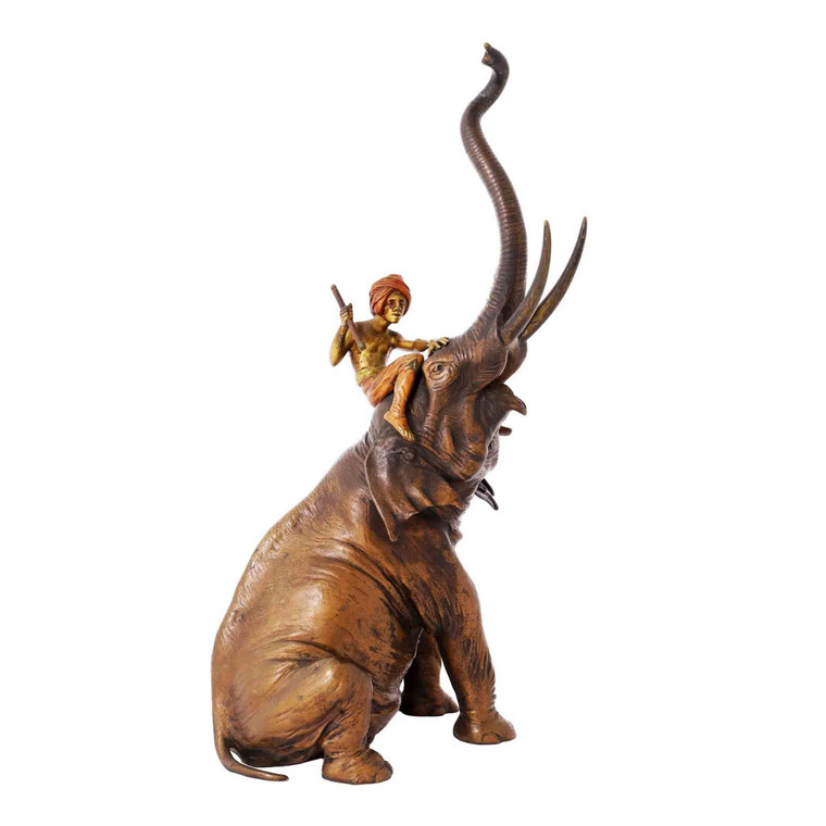A Fine Cold-Painted Bronze Sculpture of a Boy Riding an Elephant by Franz Bergman