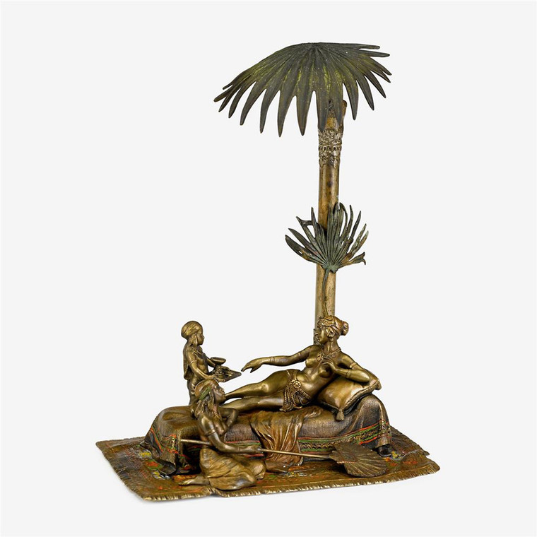 A Fine Cold Painted Austrian Bronze Lamp and Sculpture Depicting Cleopatra resting amid attendants by Anton Chotka