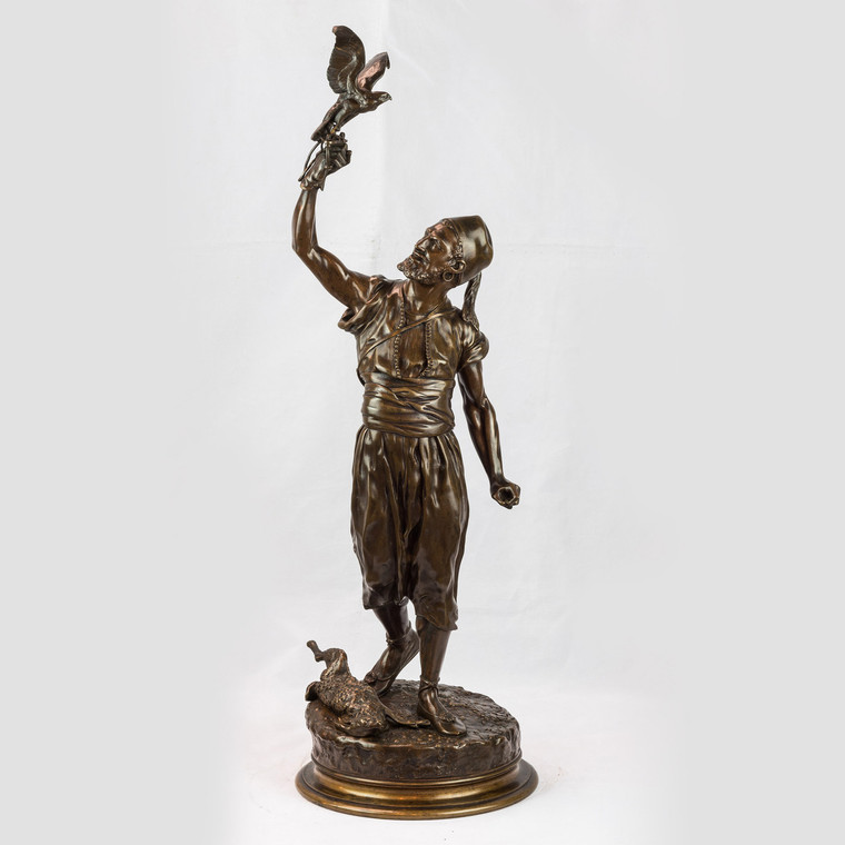 A Fine Patinated Bronze Figure of a Berber and a Hunting Falcon by Pierre Jules Mêne