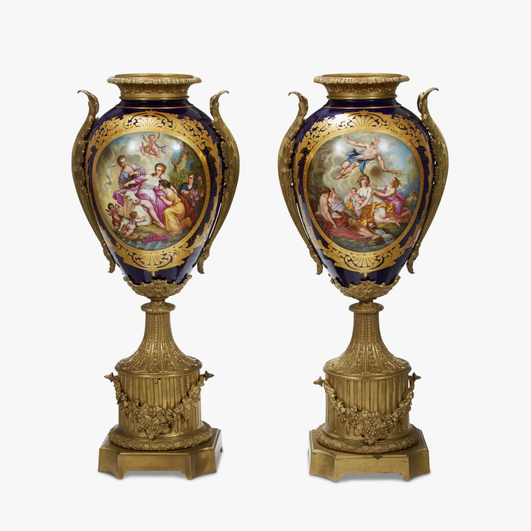 An Important Pair of Monumental Sèvres style Ormolu mounted and Cobalt Blue Painted Porcelain Urns