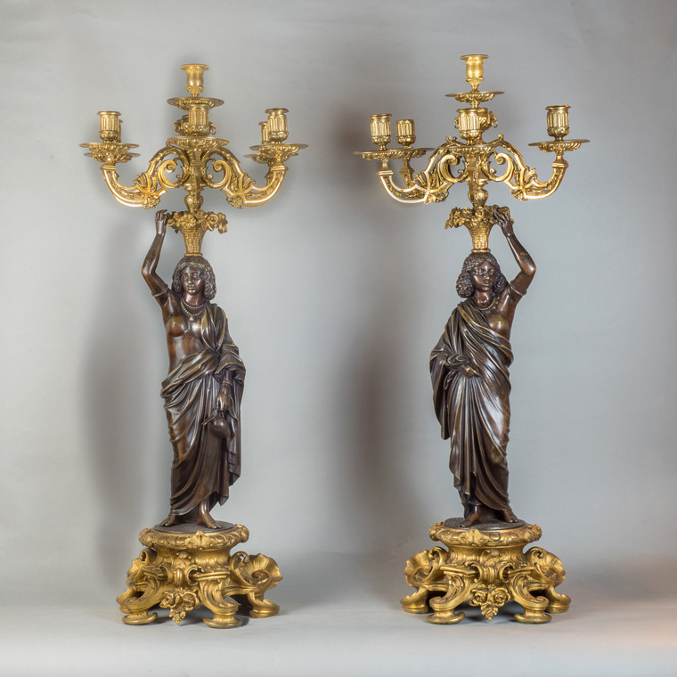 A Fine Intricate Pair of Gilt and Patinated Bronze Nubian Figural Six-Light Candelabras