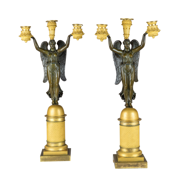 A Fine Quality Pair of French Empire Style Gilt and Patinated Bronze Three-light Figural Candelabra