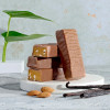 Herbalife Vanilla Almond Protein Bars (Box of 14), Bars without wrappers and almonds beside.