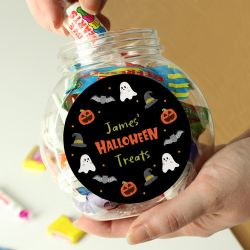 This is a great gift for the Trick or Treaters out there!

Personalise this Halloween Sweet Jar with a name up to 12 characters long to appear before the fixed text "Halloween Treats"

The 's at the end of the name is fixed therefore do NOT need to be entered.

Please note, the name is case sensitive and will appear as entered.

Sweet Jars and Content weigh a total of 250g
Sweet Jar is plastic with black plastic screw top.
Sweets are an assortment of Swizzles Matlow sweets.
May Contain Nuts.
Halal Certified
Lollipops are a potential choking hazard.

Not suitable for children under 36 months.

Ideal for Halloween.