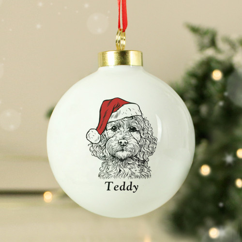 Celebrate the joy and warmth your dog brings to Christmas with our Festive Dog Breed Bauble, featuring a delightful design of your dog wearing a Santa hat!
Thoughtfully crafted to capture the unique spirit of your furry friend, this personalised bauble adds a playful, festive touch to your Christmas decor and is perfect for hanging on your Christmas tree year after year.
With breed-specific designs, each bauble beautifully showcases the likeness of your beloved dog, creating a charming and personalised addition to your tree.
Personalise this bauble by selecting your chosen breed from the dropdown list and adding your dog's name (up to 12 characters)
Please note, the design will be shown on both sides of the bauble.
Choose from these popular breeds
Dog 1 - Labrador Retriever
Dog 2 - French Bulldog
Dog 3 - Dachshund
Dog 4 - Cocker Spaniel
Dog 5 - Golden Retriever
Dog 6 - Springer Spaniel
Dog 7 - Bulldog
Dog 8 - Staffordshire Bull Terrier
Dog 9 - German Shepherd
Dog 10 - Jack Russell
Dog 11 - Border Collie
Dog 12 - Labradoodle/Cockapoo
Dog 13 - Boxer
Dog 14 - Rottweiler
Dog 15 - Pug
Dog 16 - Border Terrier
The bauble comes complete with a festive ribbon, ready to hang on the tree or around the home.
The topper style may vary.
Perfect for dog lovers who want to make their pets part of the Christmas magic! Celebrate the joy and warmth your dog brings to Christmas with our Festive Dog Breed Bauble, featuring a delightful design of your dog wearing a Santa hat!
Thoughtfully crafted to capture the unique spirit of your furry friend, this personalised bauble adds a playful, festive touch to your Christmas decor and is perfect for hanging on your Christmas tree year after year.
With breed-specific designs, each bauble beautifully showcases the likeness of your beloved dog, creating a charming and personalised addition to your tree.
Personalise this bauble by selecting your chosen breed from the dropdown list and adding your dog's name (up to 12 characters)
Please note, the design will be shown on both sides of the bauble.
Choose from these popular breeds
Dog 1 - Labrador Retriever
Dog 2 - French Bulldog
Dog 3 - Dachshund
Dog 4 - Cocker Spaniel
Dog 5 - Golden Retriever
Dog 6 - Springer Spaniel
Dog 7 - Bulldog
Dog 8 - Staffordshire Bull Terrier
Dog 9 - German Shepherd
Dog 10 - Jack Russell
Dog 11 - Border Collie
Dog 12 - Labradoodle/Cockapoo
Dog 13 - Boxer
Dog 14 - Rottweiler
Dog 15 - Pug
Dog 16 - Border Terrier
The bauble comes complete with a festive ribbon, ready to hang on the tree or around the home.
The topper style may vary.
Perfect for dog lovers who want to make their pets part of the Christmas magic!