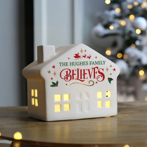 Bring a warm festive glow to your home this Christmas with our charming ceramic LED light-up house. Crafted with delicate cut-out windows, it shines beautifully when lit, filling any room with seasonal magic.
You can personalise the house with a name or message of up to 20 characters, which will appear above the fixed word 'believes'. This thoughtful detail makes it a unique decoration and a special keepsake to treasure year after year.
Measuring 13cm wide, 10cm tall and 7.5cm deep, the house is perfectly sized for a mantelpiece, shelf or windowsill. It features a simple on/off switch at the base for easy use.
Requires 3 x LR44 batteries (Batteries included)
A wonderful way to celebrate the joy of Christmas, this personalised decoration is perfect for gifting or adding a magical finishing touch to your own festive display.
Perfect for Christmas Bring a warm festive glow to your home this Christmas with our charming ceramic LED light-up house. Crafted with delicate cut-out windows, it shines beautifully when lit, filling any room with seasonal magic.
You can personalise the house with a name or message of up to 20 characters, which will appear above the fixed word 'believes'. This thoughtful detail makes it a unique decoration and a special keepsake to treasure year after year.
Measuring 13cm wide, 10cm tall and 7.5cm deep, the house is perfectly sized for a mantelpiece, shelf or windowsill. It features a simple on/off switch at the base for easy use.
Requires 3 x LR44 batteries (Batteries included)
A wonderful way to celebrate the joy of Christmas, this personalised decoration is perfect for gifting or adding a magical finishing touch to your own festive display.
Perfect for Christmas
