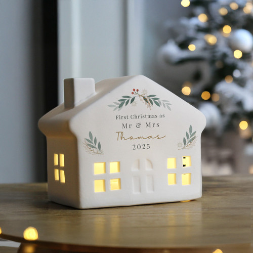 Bring a warm festive glow to your home this Christmas with our charming ceramic LED light-up house. Crafted with delicate cut-out windows, it shines beautifully when lit, filling any room with seasonal magic.
You can personalise the house with a message over 4 lines, as below
Line 1 - 25 characters
Line 2 - 20 characters
Line 3 - 12 characters
Line 4 - 20 characters
Please note, all personalisation is case sensitive and will appear as entered.
Measuring 13cm wide, 10cm tall and 7.5cm deep, the house is perfectly sized for a mantelpiece, shelf or windowsill.
It features a simple on/off switch at the base for easy use.
A wonderful way to celebrate the joy of Christmas, this personalised decoration is perfect for gifting or adding a magical finishing touch to your own festive display.
Requires 3 x LR44 batteries (Batteries included)
Perfect for Christmas Bring a warm festive glow to your home this Christmas with our charming ceramic LED light-up house. Crafted with delicate cut-out windows, it shines beautifully when lit, filling any room with seasonal magic.
You can personalise the house with a message over 4 lines, as below
Line 1 - 25 characters
Line 2 - 20 characters
Line 3 - 12 characters
Line 4 - 20 characters
Please note, all personalisation is case sensitive and will appear as entered.
Measuring 13cm wide, 10cm tall and 7.5cm deep, the house is perfectly sized for a mantelpiece, shelf or windowsill.
It features a simple on/off switch at the base for easy use.
A wonderful way to celebrate the joy of Christmas, this personalised decoration is perfect for gifting or adding a magical finishing touch to your own festive display.
Requires 3 x LR44 batteries (Batteries included)
Perfect for Christmas