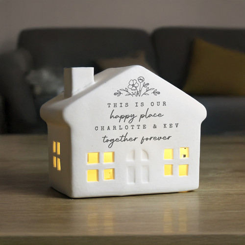 Bring a warm festive glow to your home this Christmas with our charming ceramic LED light-up house. Crafted with delicate cut-out windows, it shines beautifully when lit, filling any room with seasonal magic.
You can personalise the house with a message over 4 lines, as below
Line 1 - 20 characters
Line 2 - 25 characters
Line 3 - 20 characters
Line 4 - 25 characters
Please note, the personalisation on lines 1 and 3 will appear in fixed UPPERCASE. All other personalisation is case sensitive and will appear as entered.
Measuring 13cm wide, 10cm tall and 7.5cm deep, the house is perfectly sized for a mantelpiece, shelf or windowsill.
It features a simple on/off switch at the base for easy use.
A wonderful way to celebrate the joy of Christmas, this personalised decoration is perfect for gifting or adding a magical finishing touch to your own festive display.
Requires 3 x LR44 batteries (Batteries included)
Perfect for Christmas Bring a warm festive glow to your home this Christmas with our charming ceramic LED light-up house. Crafted with delicate cut-out windows, it shines beautifully when lit, filling any room with seasonal magic.
You can personalise the house with a message over 4 lines, as below
Line 1 - 20 characters
Line 2 - 25 characters
Line 3 - 20 characters
Line 4 - 25 characters
Please note, the personalisation on lines 1 and 3 will appear in fixed UPPERCASE. All other personalisation is case sensitive and will appear as entered.
Measuring 13cm wide, 10cm tall and 7.5cm deep, the house is perfectly sized for a mantelpiece, shelf or windowsill.
It features a simple on/off switch at the base for easy use.
A wonderful way to celebrate the joy of Christmas, this personalised decoration is perfect for gifting or adding a magical finishing touch to your own festive display.
Requires 3 x LR44 batteries (Batteries included)
Perfect for Christmas