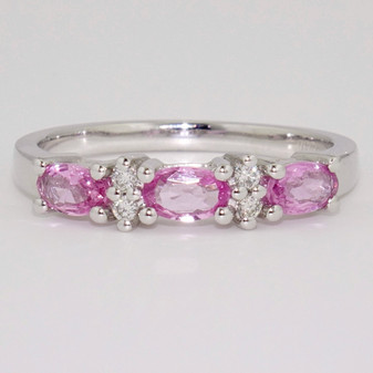 Platinum pink sapphire and diamond eternity ring