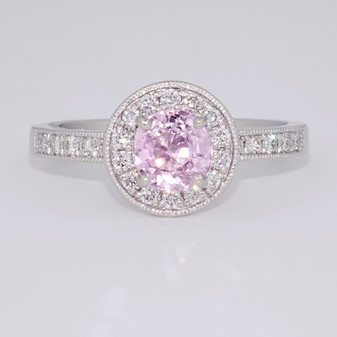 Platinum pink tanzanite and diamond ring with diamond-set shoulders