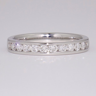 Platinum channel set diamond ring