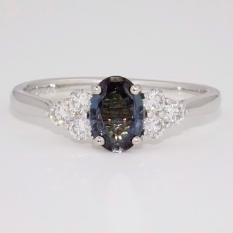 Platinum oval cut alexandrite and diamond ring