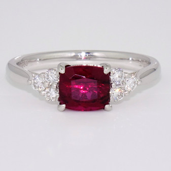 Platinum cushion cut pink tourmaline and round brilliant cut diamond ring