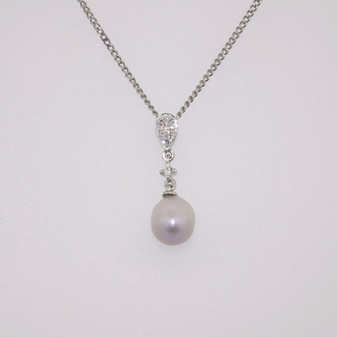 18ct white gold Scottish freshwater pearl and round brilliant cut diamond pendant with diamond-set bail