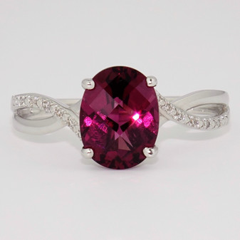 9ct white gold oval cut raspberry garnet and diamond ring 9ct white gold oval cut raspberry garnet and diamond ring