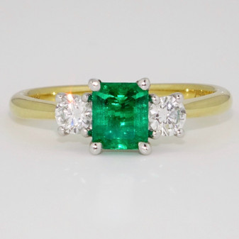 18ct gold emerald cut emerald and round brilliant cut diamond ring