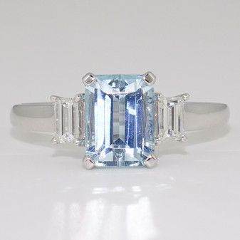 Platinum emerald cut aquamarine and baguette cut diamond ring