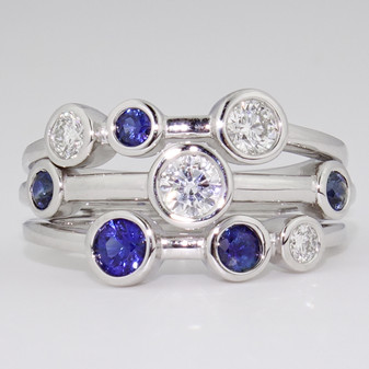 Platinum round cut sapphire and round brilliant cut diamond bubble ring