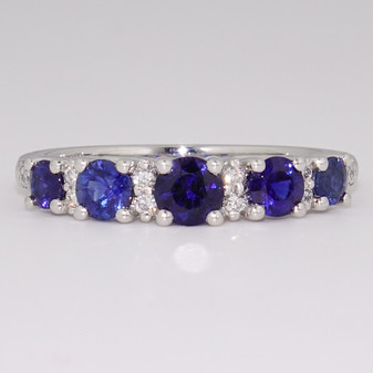 Platinum round cut sapphire and round brilliant cut diamond ring