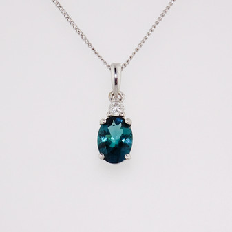 9ct white gold oval cut indicolite tourmaline and round brilliant cut diamond pendant