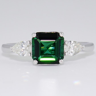 Platinum octagonal cut green tourmaline and pear cut diamond ring