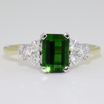 18ct gold and platinum emerald cut green tourmaline and round brilliant cut diamond ring