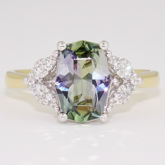 18ct gold and platinum unheated fancy cut mermaid tanzanite ring with diamond leaf shoulders