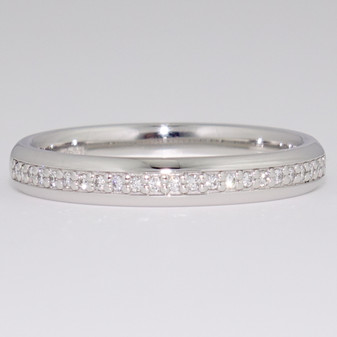 Platinum pavé-set round brilliant cut diamond ring