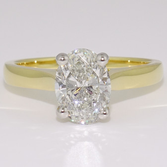 18ct gold and platinum certificated oval diamond solitaire ring