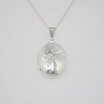 Sterling silver half engraved oval locket