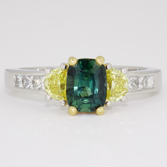 Platinum and 18ct gold teal sapphire and diamond ring