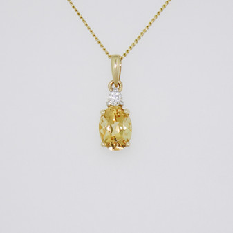 9ct gold Imperial topaz and diamond pendant