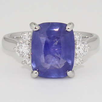 Platinum rectangular cushion cut Ceylon sapphire and round brilliant cut diamond ring