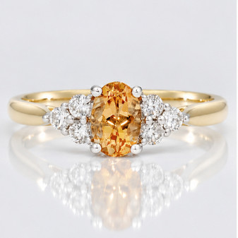 9ct gold oval cut Imperial topaz and round brilliant cut diamond ring