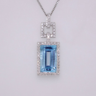9ct white gold blue topaz and diamond cluster pendant with diamond square and bail