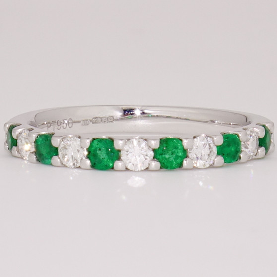 Platinum emerald and diamond ring
