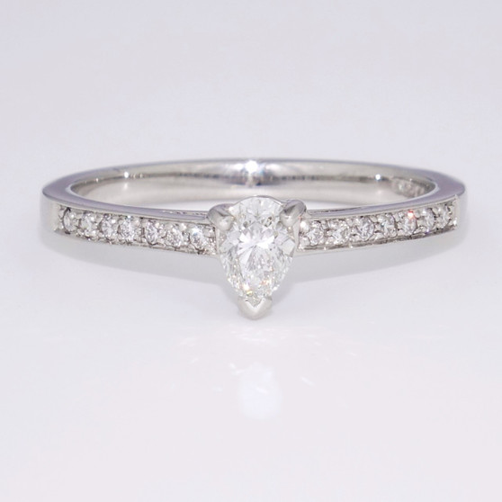 Platinum pear cut diamond solitaire ring with diamond-set shoulders GR3710