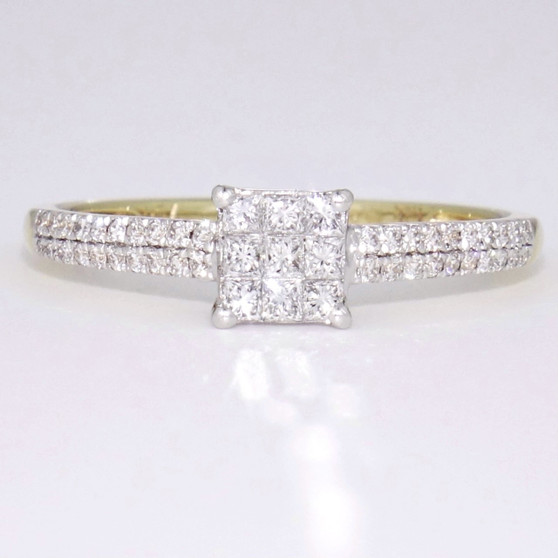 Yellow and white gold tile set princess cut diamond ring with diamond-set shoudlers