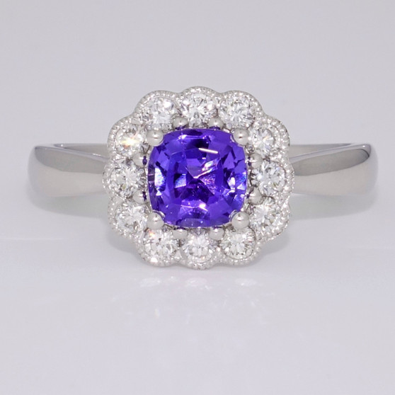 Platinum cushion cut tanzanite and diamond cluster ring