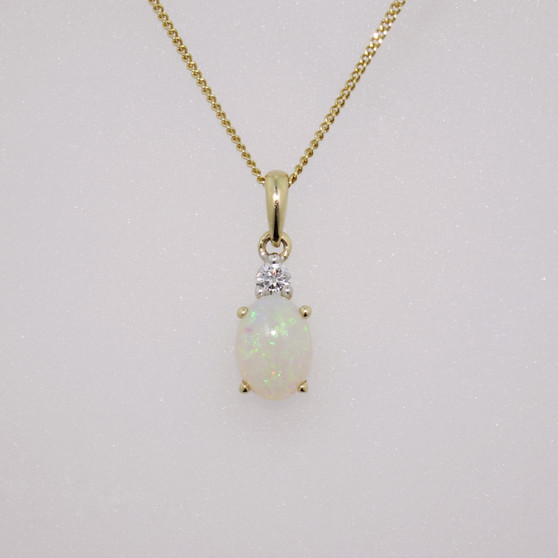 9ct gold opal and diamond pendant