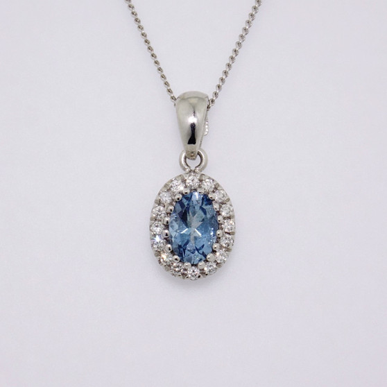 18ct white gold oval cut aquamarine and round brilliant cut diamond cluster pendant