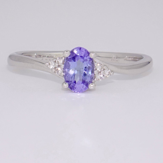 9ct white gold oval cut tanzanite and diamond twist ring