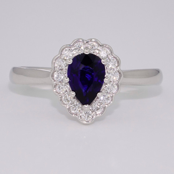 Platinum pear cut sapphire and round brilliant cut diamond cluster ring